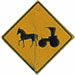 Horse-and-carriage roadsign, typical for the Clymer area