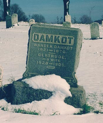 Gravestone with text: Wander Damkot 1821-1870. Gertrude his wife 1828-1905.