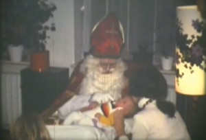 Baby in the lap of Saint Nicholas