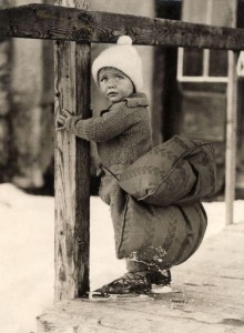 Boy on skates with a pillow tied to his bottom