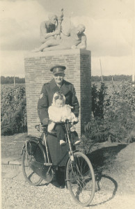 Soldier and child on a bike
