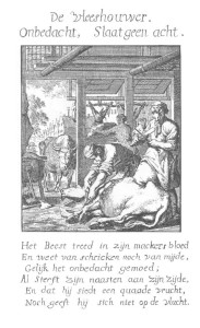 butcher cleaving the meat