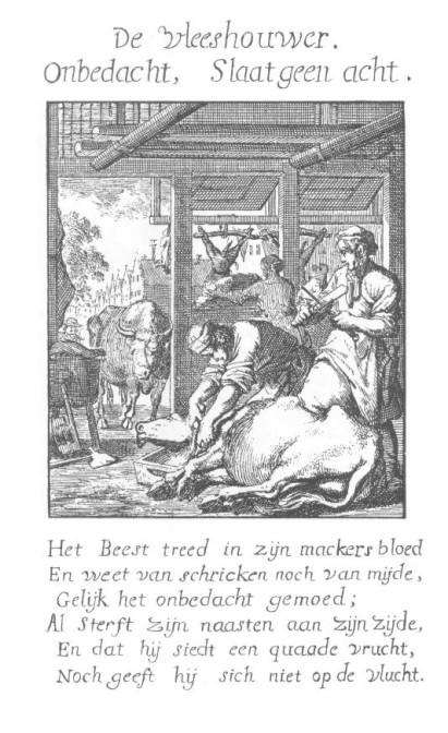 butcher cleaving the meat