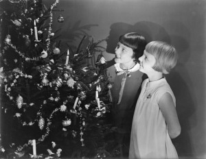 Girls looking at a Christmas tree