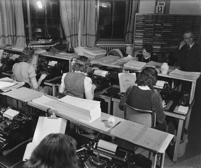 women in a type room