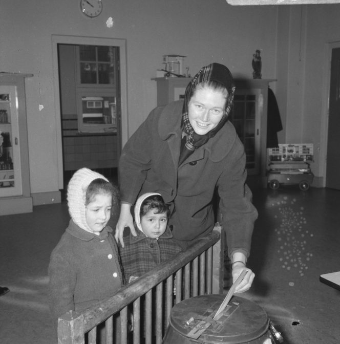 woman casting a ballot