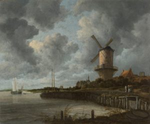 windmill next to a river